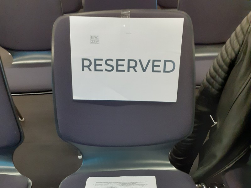Conference chair with reserved sign