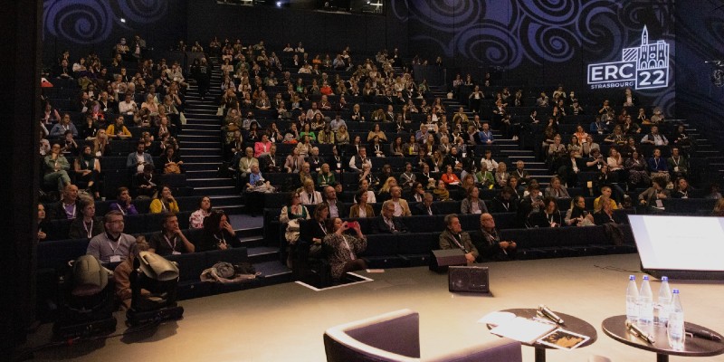 Conference delegates in a lecture theatre