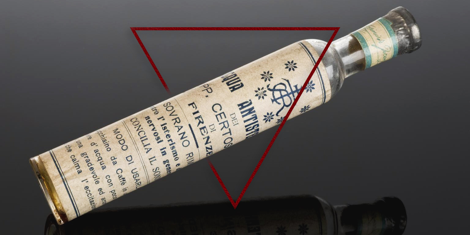 Glass bottle, containing 'anti-hysteria water', Florence, Italy, 1850-1920 from the Science Museum collection. The image has been modified to include a red triangle around the bottle.